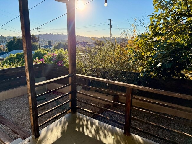 Building Photo - Hilltop Highland Park Sanctuary with Views, Private Gated Yard, In Unit Laundry, Parking & Abunda...