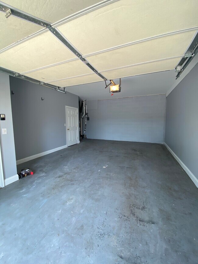 Very LARGE garage space. Enough room for a care and storage. Plus a separate storage room. - 137 High Ridge Rd