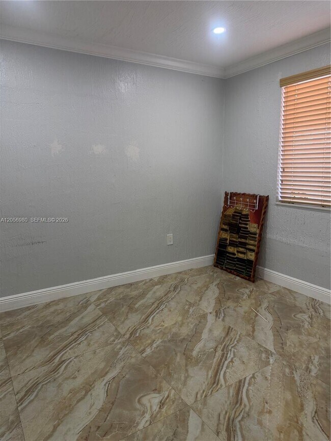 Building Photo - 240 Tamiami Canal Rd