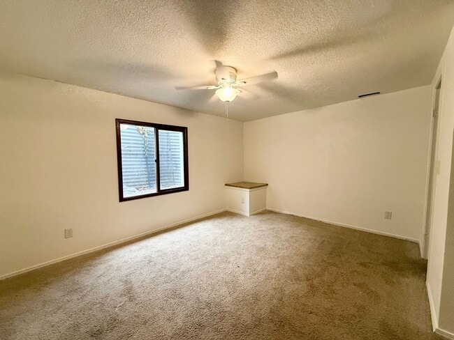 Building Photo - Beautifully Updated 5 Bedroom Rockrimmon Ranch Home Backing to Open Space