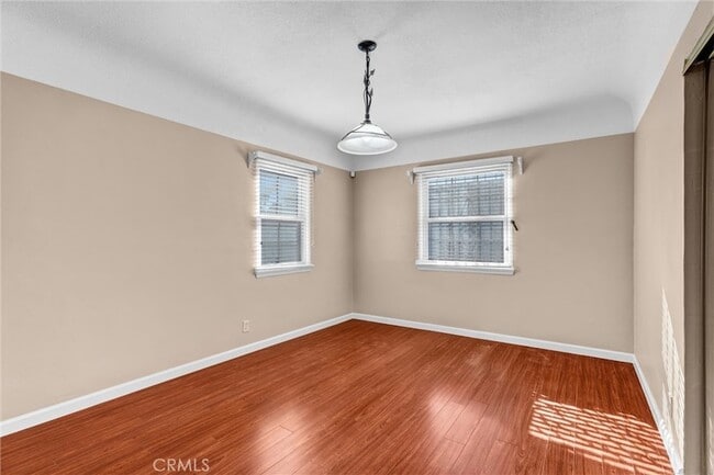 Building Photo - 9807 S Denker Ave