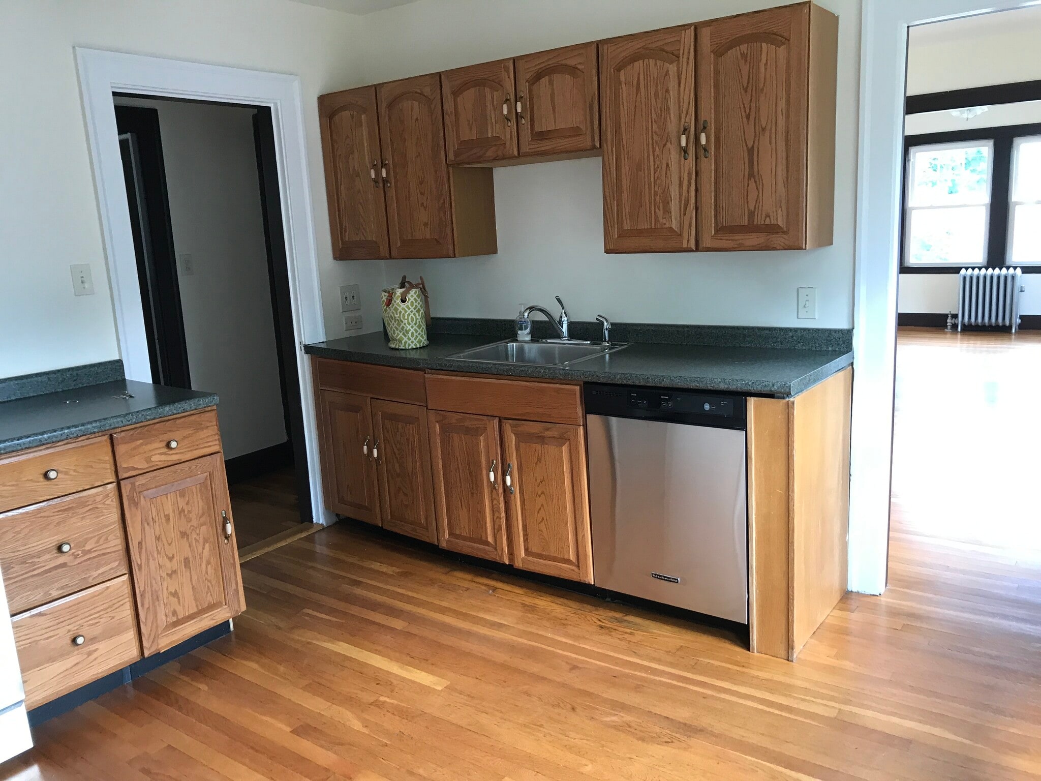 Kitchen includes a walk in pantry and refrigerator in back hallway - 147 Farrington St