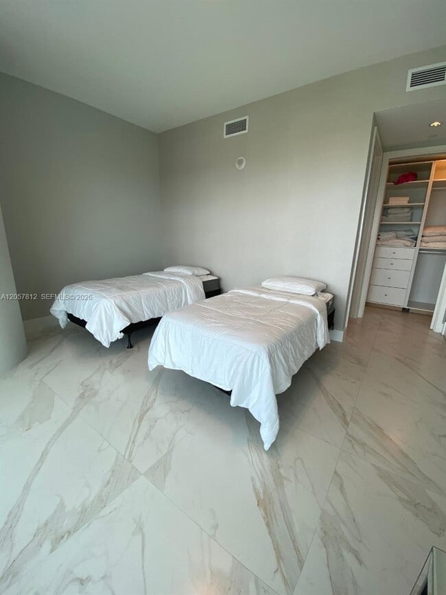 Building Photo - 10201 Collins Ave