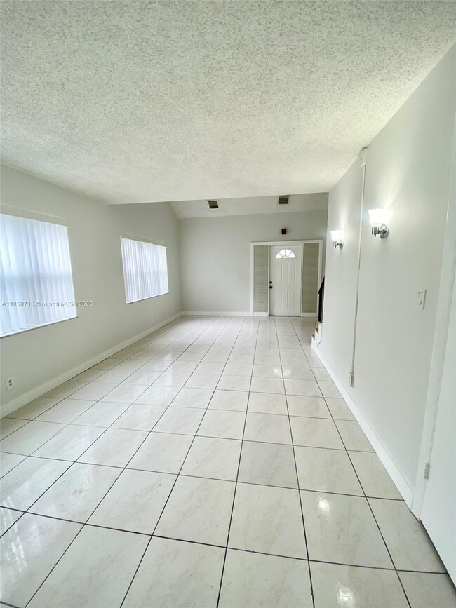 Building Photo - 3200 Coral Springs Dr