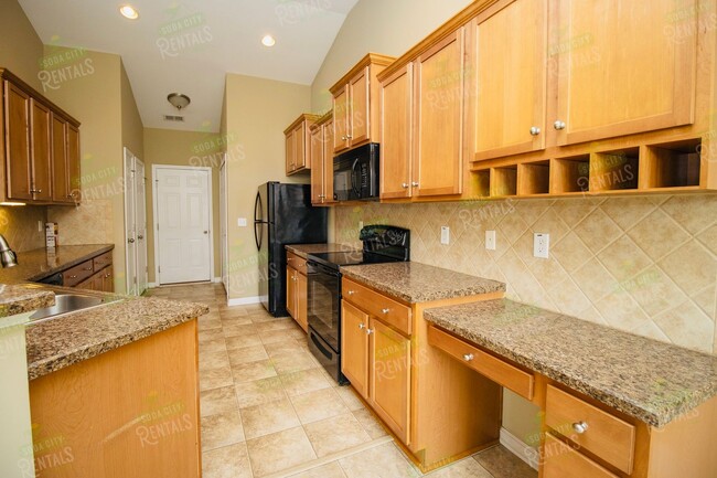 Building Photo - Stunning 4BR/3BA Home in Heritage Farms – ...