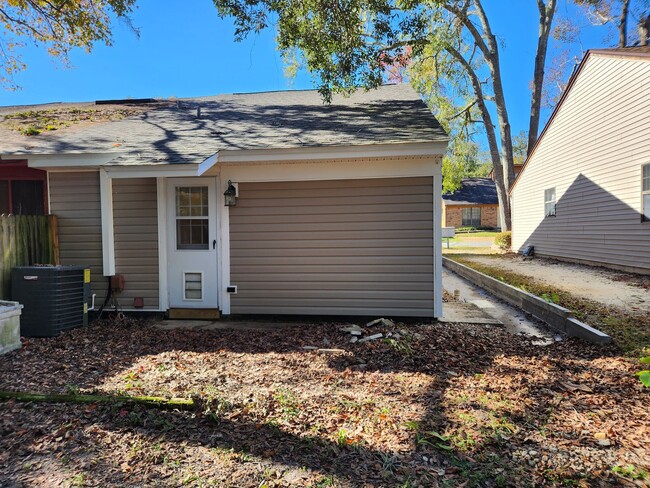 Building Photo - Updated 2 bedroom duplex with all wood flo...