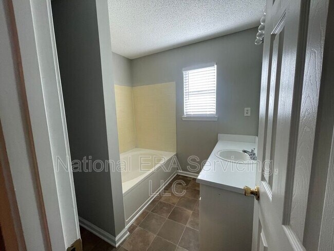 Building Photo - 703 Addy Cove