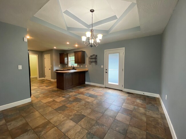 Building Photo - Your Dream Rental Awaits in Osage Hills – ...