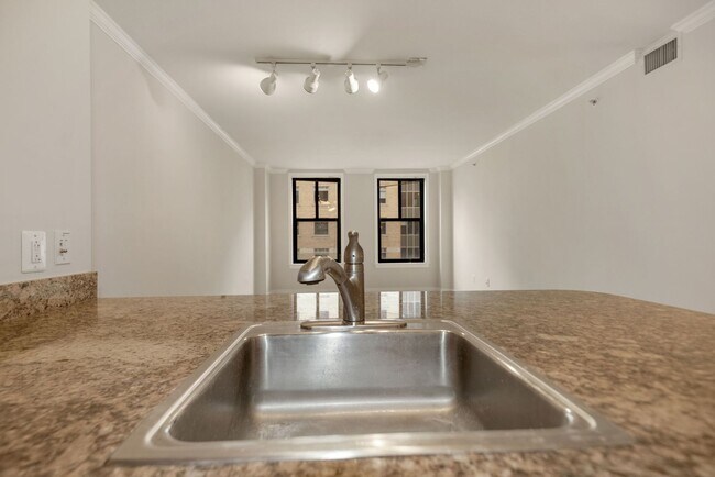 Building Photo - $400 Off! Professionally Managed, Spacious...