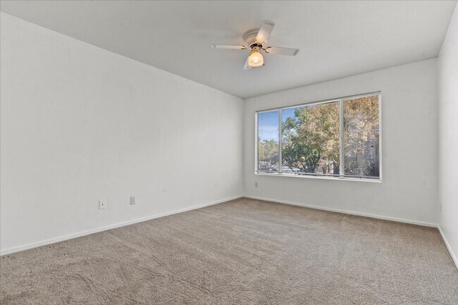Building Photo - Bright, Modern 2 Bedroom Upstairs Condo, Community Pool, Gated, Covered Parking