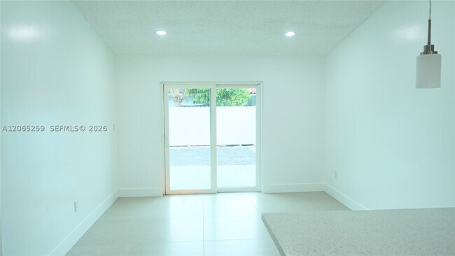 Building Photo - 5661 W 21st Ave