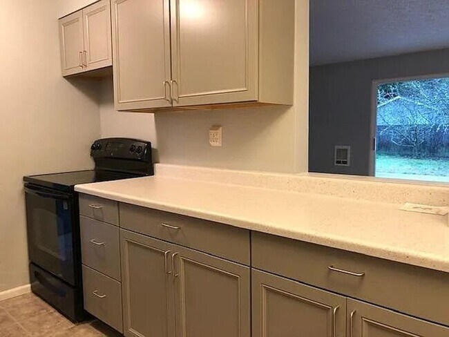 Building Photo - Updated 3 Bdr, 1 1/2 bath with garage and ...