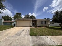 Building Photo - Updated Home with Spacious Backyard