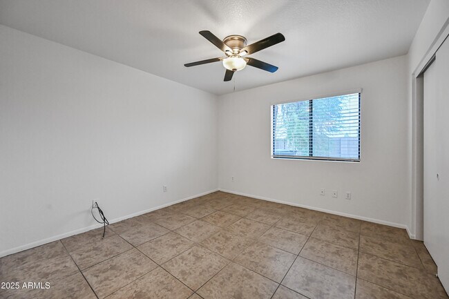 Building Photo - 8606 W College Dr
