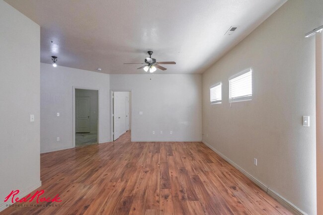 Building Photo - Fresh Carpet! Spacious 5-Bedroom Townhome