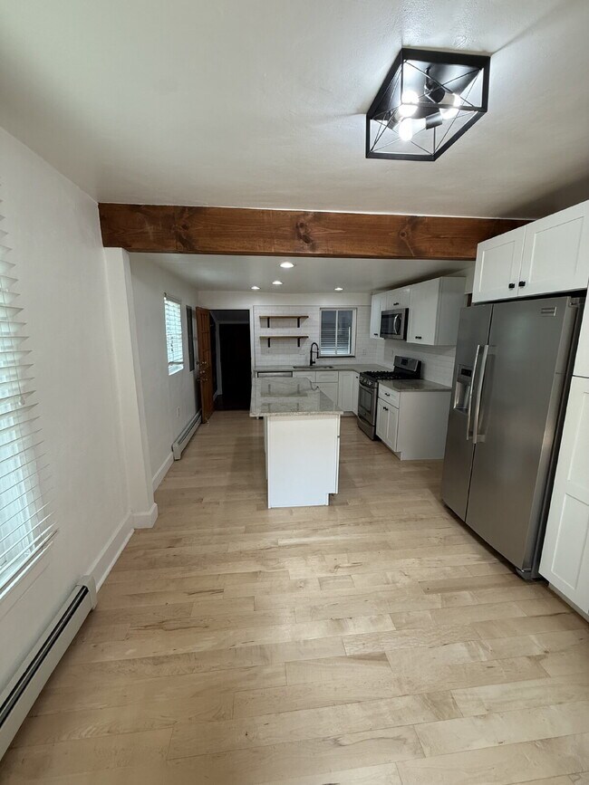 Building Photo - "Charming 2-Bed, 2-Bath Oasis in Denver’s Vibrant Locale – 1,313 Sq. Ft. of Cozy Elegance!"