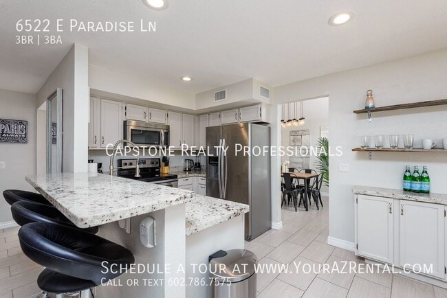 Building Photo - 6522 E Paradise Ln