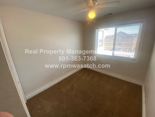 Building Photo - Move In Special!  1/2 Off First Months Rent  Check Out This 3 bed, 2 bath Condo with Hardwood Flo...