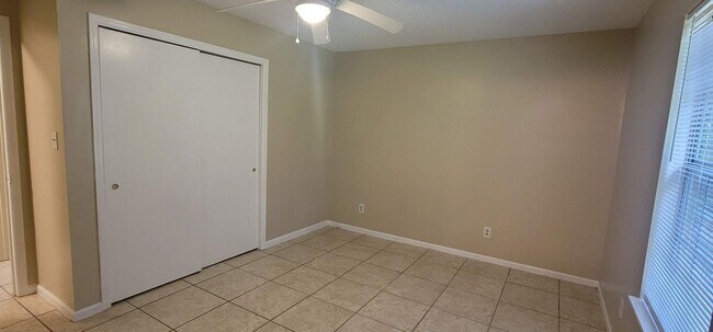 Building Photo - CHARMING SE 3/1.5 w/ Garage, Washer/Dryer, Large Privacy Fenced Yard, & Tile Floors Throughout! A...