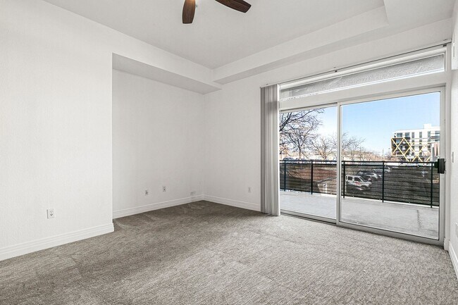 Building Photo - Fantastic Condo With Central AC And 1 Reserved Garage Parking Space!
