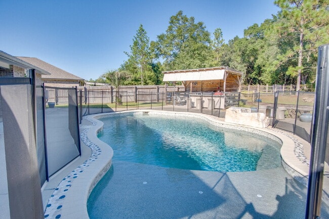 Building Photo - Backyard Bliss: Pool, Cabana & Fire Pit in...