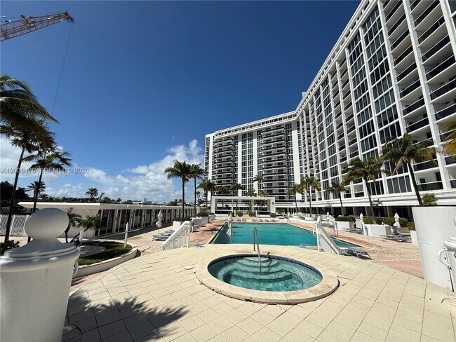 Building Photo - 10275 Collins Ave