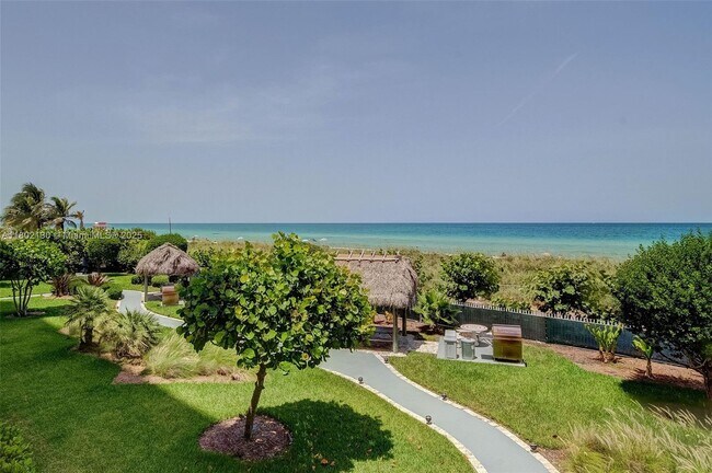 Building Photo - 6423 Collins Ave