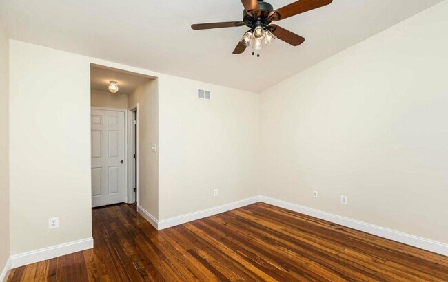 Building Photo - Charming 2bdrm 2.5 bath Patterson Park home with parking and rooftop deck