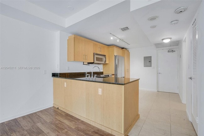 Building Photo - 10275 Collins Ave