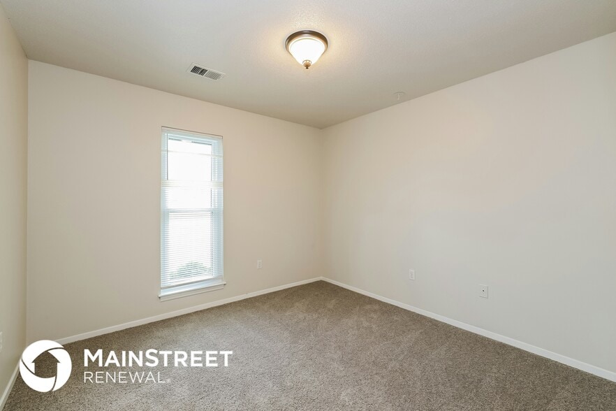 Building Photo - 10089 Riggan Dr