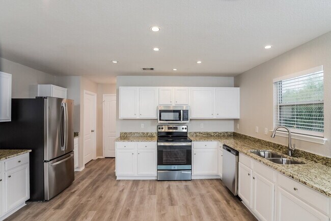 Building Photo - 10711 Amble Coach