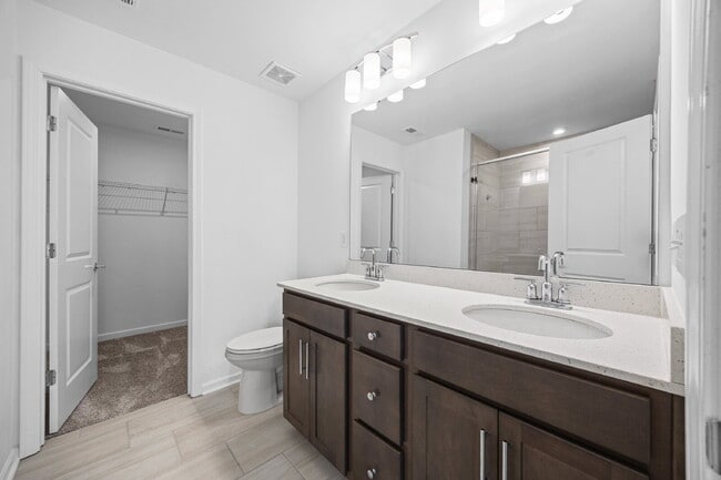 Building Photo - Spacious 3BR Townhome with Garage, Open Layout & Community Pool – Move-In Ready!