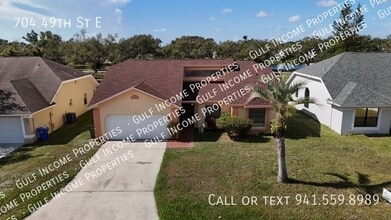 Building Photo - 704 49th St E