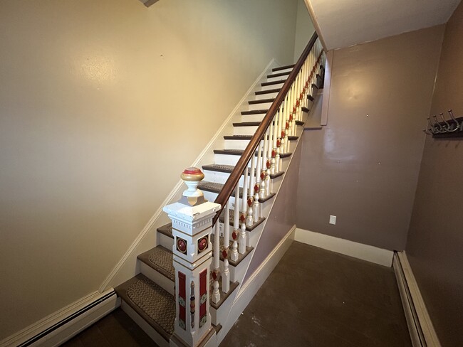 Entry way stairs. - 23 Pleasant St