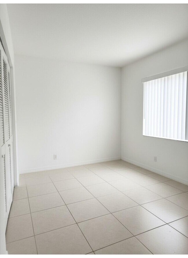 Building Photo - 8820 Royal Palm Blvd