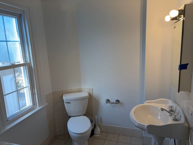 Building Photo - Elegant 3 Story Brick Corner Property Now Available