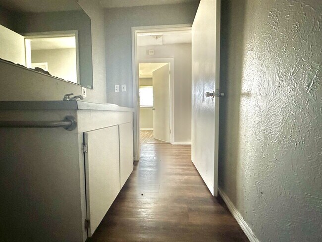 Building Photo - Updated Home with Gorgeous Floors & Large Backyard