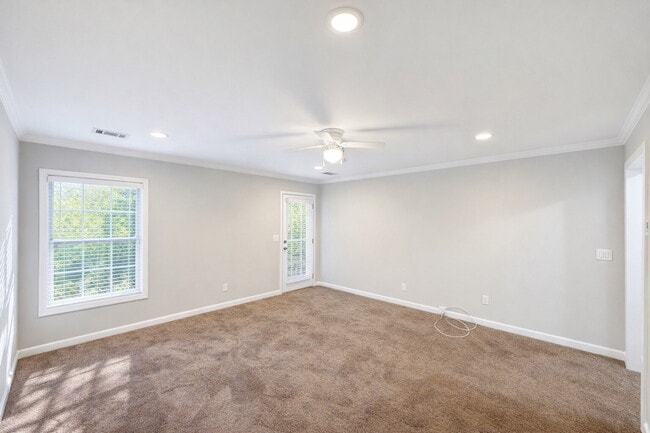 Building Photo - Gated Johns Creek Townhome Offering Space, Privacy, and Everyday Convenience