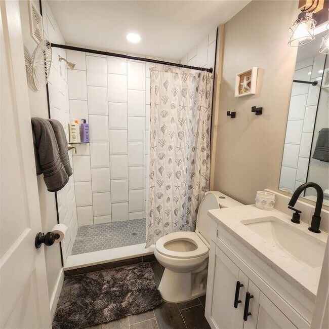 Building Photo - 8535 Blind Pass Dr