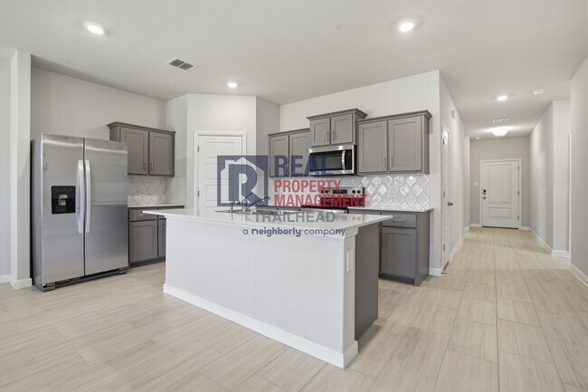 Building Photo - Inviting 4-Bedroom Layout with Flexible Living Areas