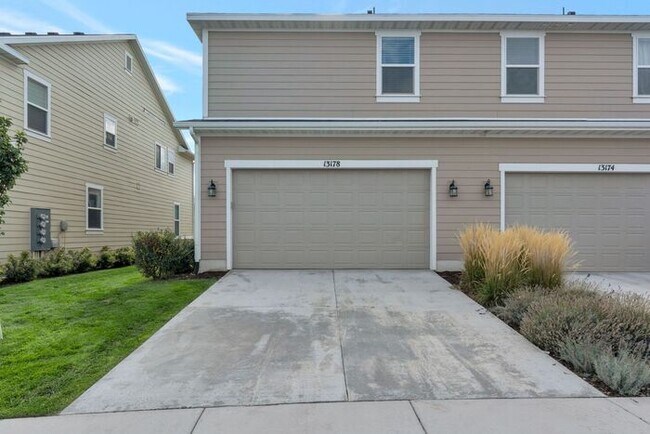 Building Photo - Beautiful Row End Townhouse w 2 car attached