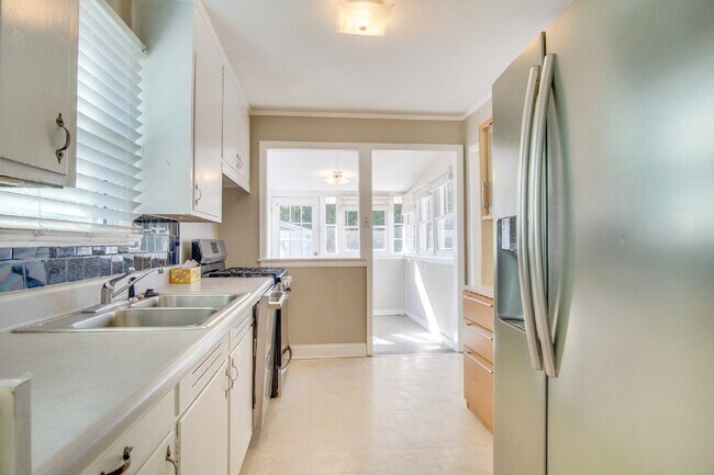 Building Photo - 3-Bedroom, 1-Bathroom Cottage in East Hill with Solar Power & Wraparound Deck!