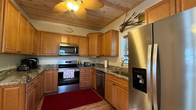 Building Photo - Charming 2 Bedroom Furnished Home on E. Front Street in TC