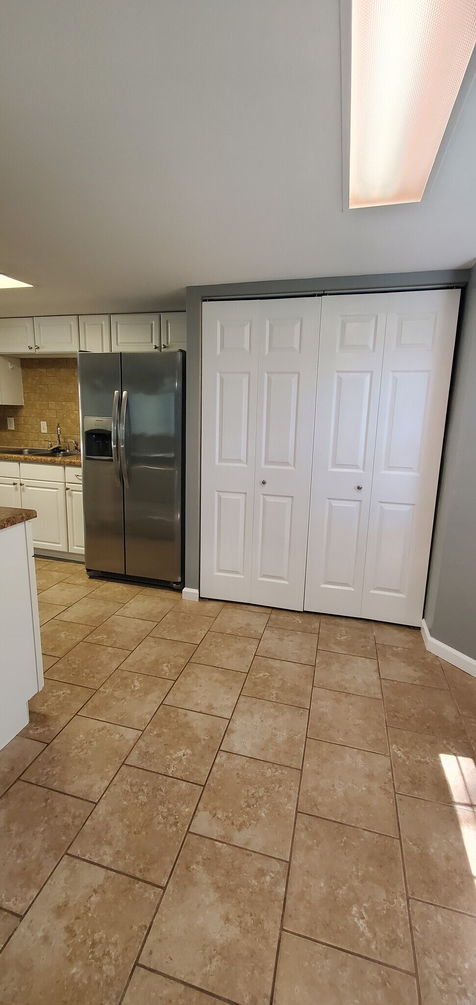 Laundry closet off Kitchen - 313 Britanna Dr