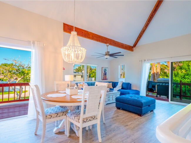 Top of stairs, dining and living room. Kitchen deck(L), Living room deck (R) - 3250 E De Bazan Ave