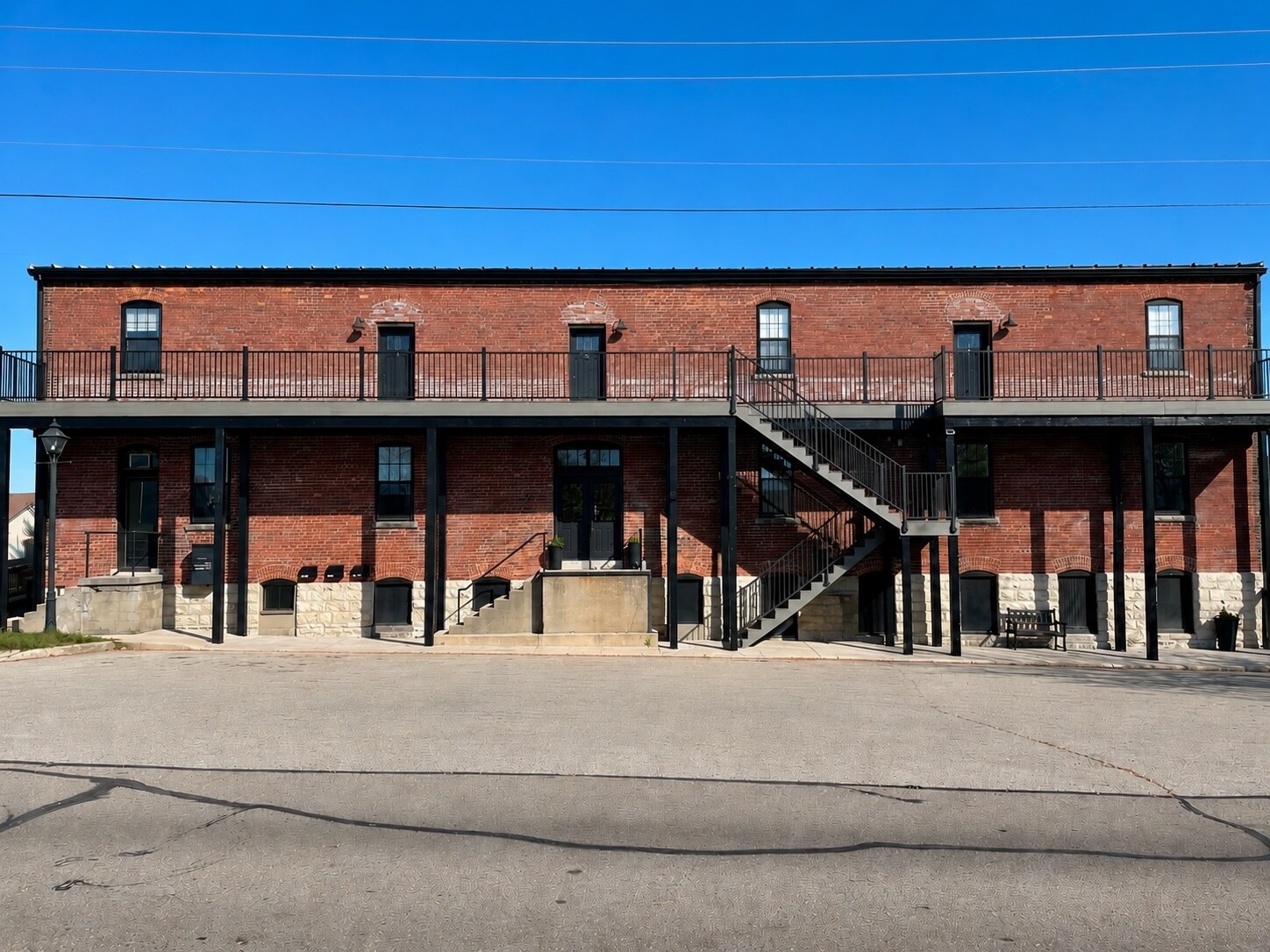 Parking spaces for up to two vehicles and private staircase accessibility - 101 W Broadway St