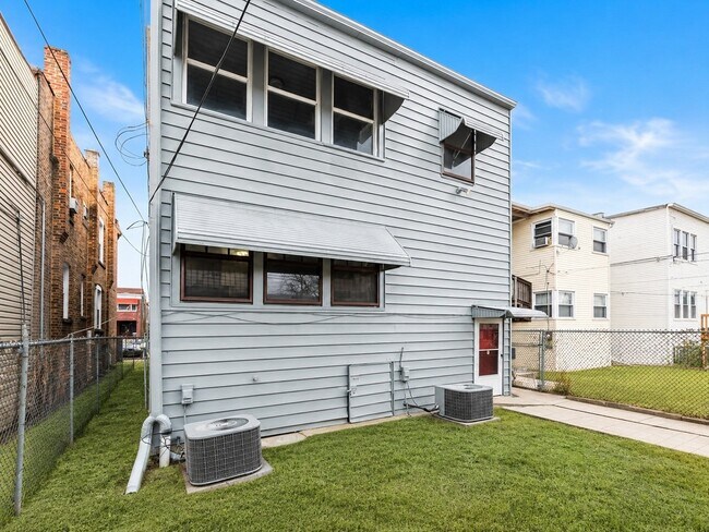 Building Photo - 7514 S Langley Ave