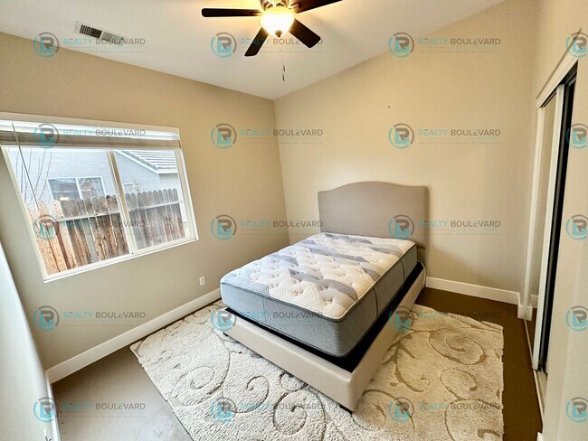 Building Photo - Open Kitchen, Expansive Living, and Covered Patio in Tranquil South Reno Near Trails, Parks & Sho...