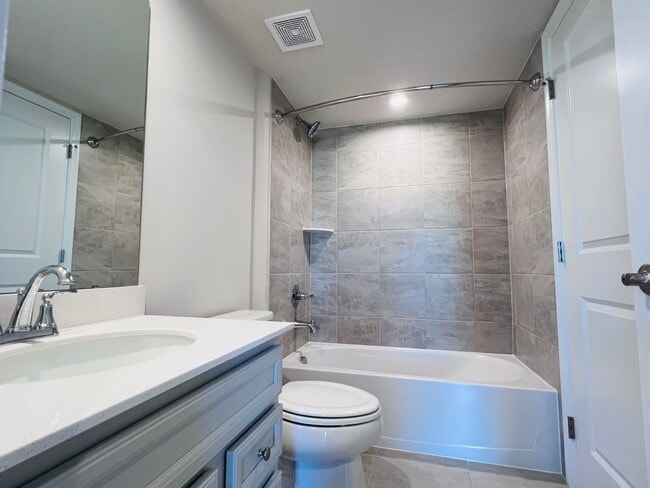 Building Photo - MINUTES TO VRE AND ALL THE CONVENIENCES OF...