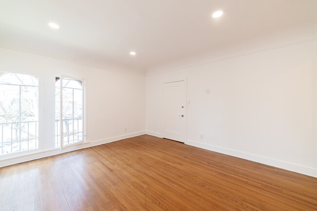 Building Photo - A Grand, Light-Filled 1-Bedroom with Bonus...